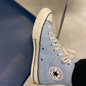 I am selling a pair of nice blue barely worn 9.5 inch Chuck 70 high top sneakers